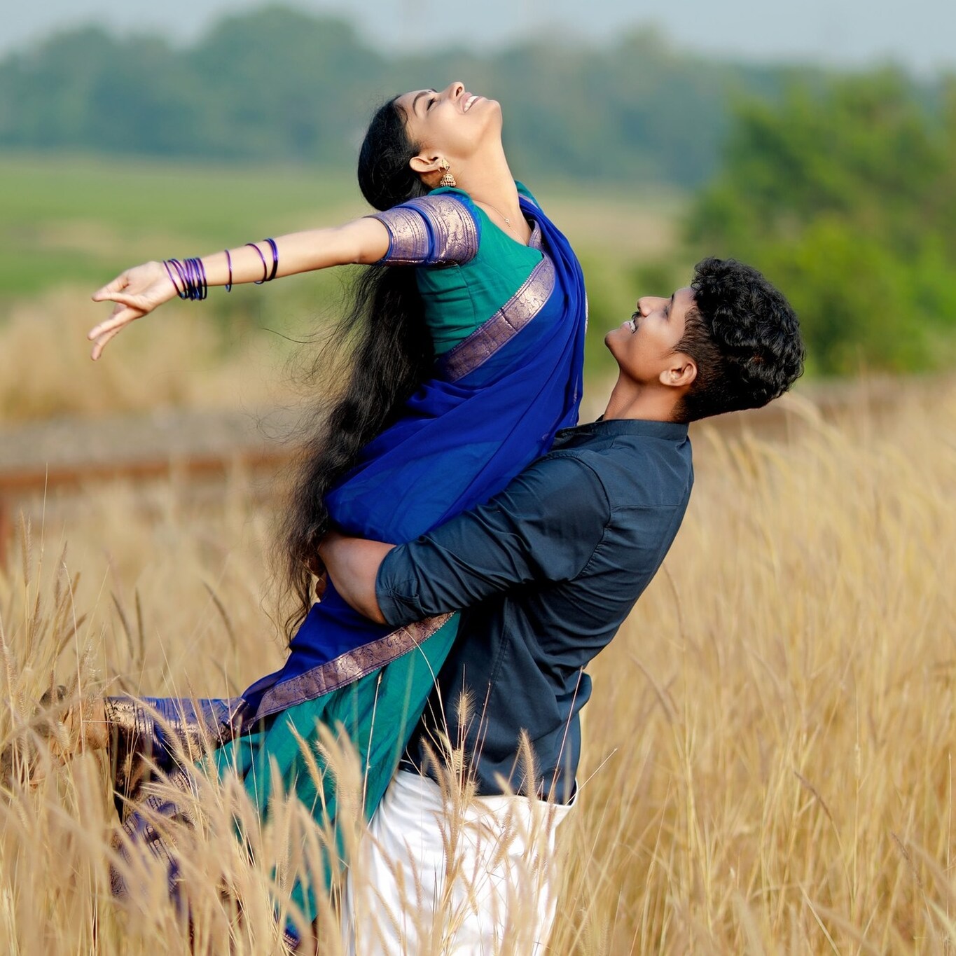 Pre-wedding couple photoshoot at a scenic Kerala backwater location by 7Ads Wedding Company, Kayamkulam